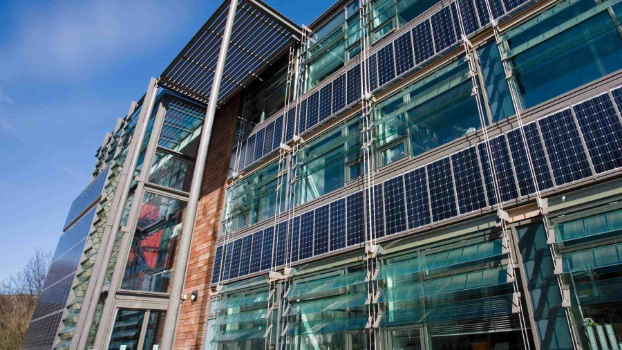 Solar panels installed on the exterior of an office building
